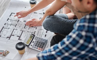 close-up-of-couple-calculating-costs-of-new-house-2024-11-25-14-02-29-utc